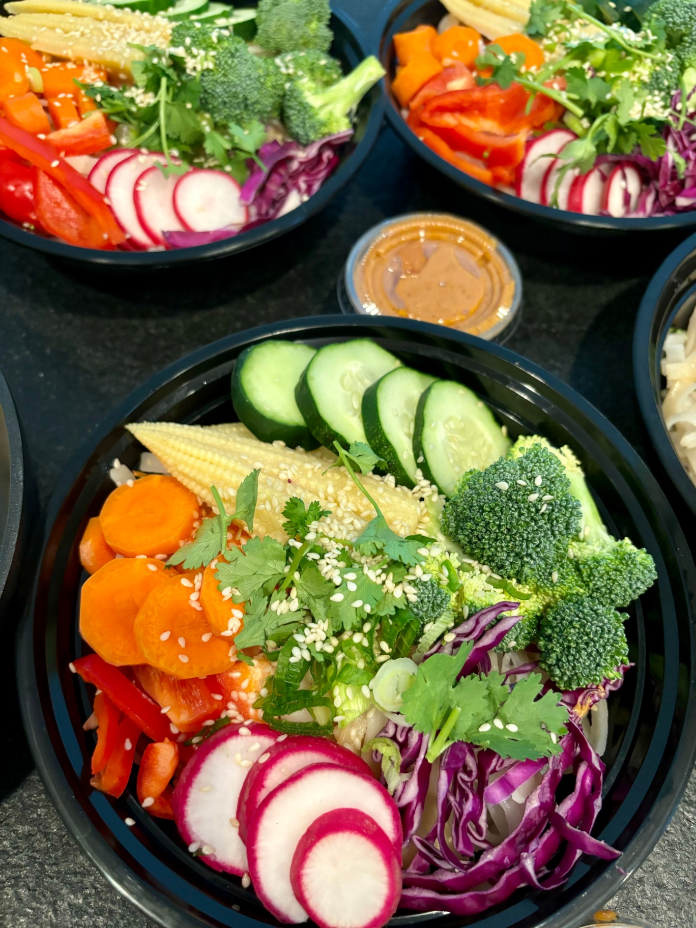 Fresh veggie noodle bowls with peanut sauce